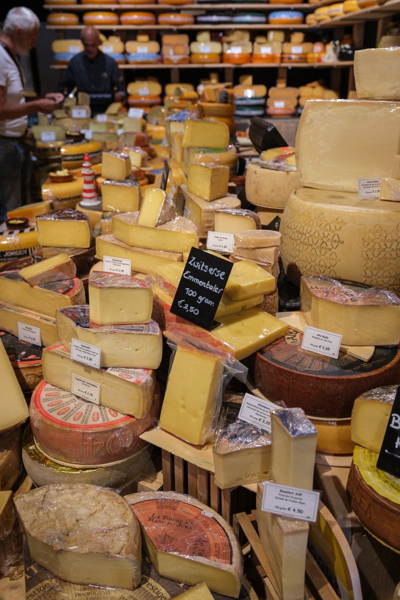 A wedge of aged cheddar cheese.